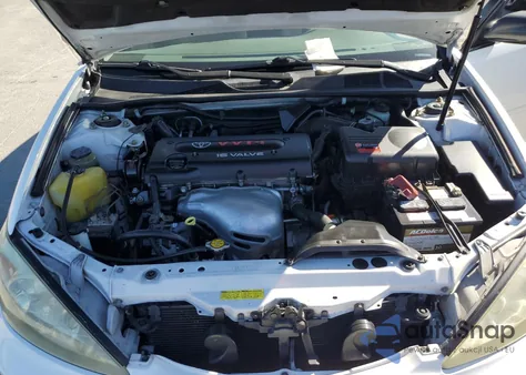 2004 Toyota Camry Le z USA, uszkodzony, nr VIN JTDBE30KX40269724